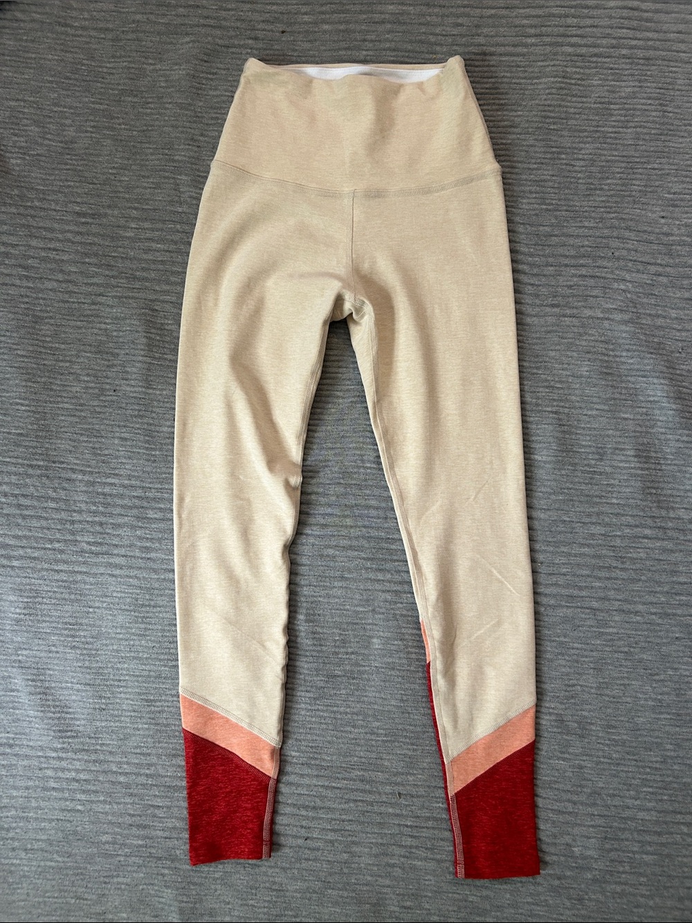 Beyond Yoga Beige Leggings with Pink and Red Accents